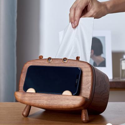 China Modern Solid Luxury Paper Gift Fancy Stand Fancy Mobile Phone Mining Light Desk Living Room Laser Black Wooden Tissue Box for sale