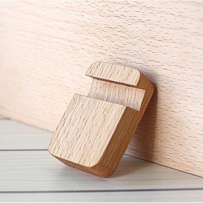 China Small Adjustable Desktop Simple Square Stand Portable Craft Gift Engraved Logo Wooden Mobile Phone Stand for sale