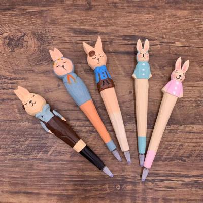 China Promotion Wooden Handmade Animal Gift Pen Hot Sale Wooden Material Cut Out Ballpen Carving Pen With Animal Shape for sale