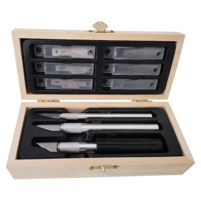 China Free Sample Quick-change DIY Art Craft Tool Carving Knife With Wooden Handle 36 Pcs Rubber Hobby Knife Set for sale