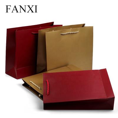 China Wholesale Custom FANXI Security Factory Printing Logo Gift Paper Shopping Bag With Handle for sale