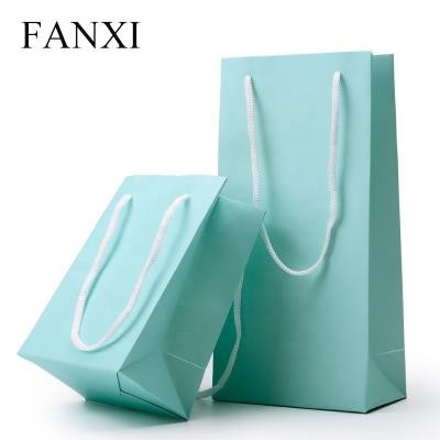 China FANXI China Factory Custom Wholesale Security Green Faux Leather Fancy Paper Handbags for Gifts Packaging Jewelry and Gift Paper Bags for sale