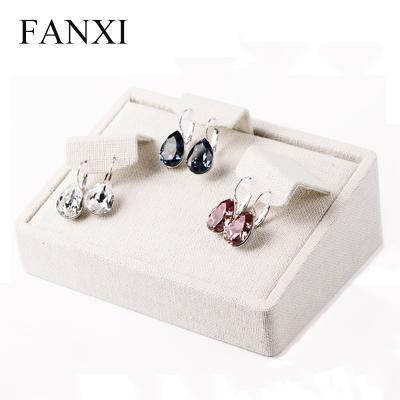 China New Fashion Beige Canvas Earring Stand Holder With Free Pierce Pads FANXI New Ear Exhibitor Earring Jewelery Displays Free Wholesale Beige Canvas Stud Prop Stand Holder earring holder for sale