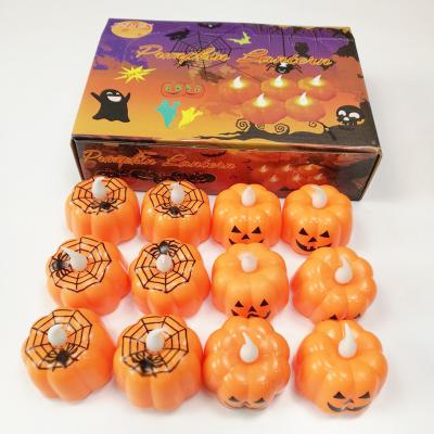 China Plastic Pumpkin Tea Flameless Candles Light LED Face Tealight For Outdoor Halloween Holiday Party Decor Lantern Bucket for sale