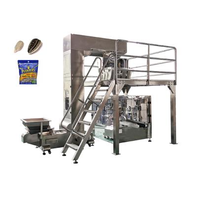 China Food Premade Zipper Pouch Sunflower Seeds Rotary Packaging Machine With Combination Multi Head Scale for sale