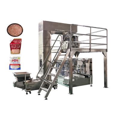 China Food Pouch Ore Salt Premade Rotary 8 Station Spouted Pouch Packaging Machine With Linear Scale Weigher for sale