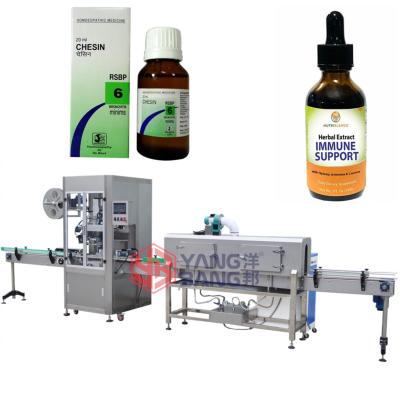 China YB-TB200 Automatic Food Round Bottle Shrink Label Sleeve Wrap Sleeve Labeling Machine 30ml 60ml for sale