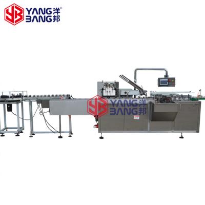 China Automatic Beverage Skin Serum Machine 1fl Ounce Paper Box Cartoning Packing Machine For Dropper Amber Glass Bottle for sale