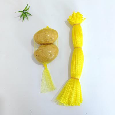 China PP new materials Fully Stocked Preferential Plastic Bag Yellow Mesh Bags For Potato And Onion for sale