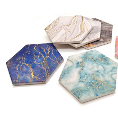 China Custom Sustainable Gold Marble Hexagon Water Absorbent Ceramic Beer Coaster With Stand for sale