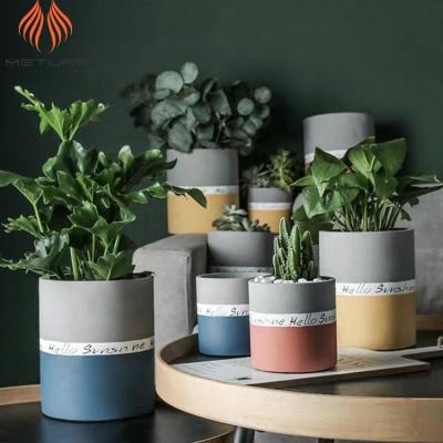 China Gray Cylindrical Water Proof And Gold Cement Pots For Plants Flower Indoor Custom Flower Pots for sale