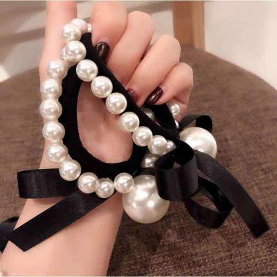 China Small bow style tie hair ribbon retro vintage pearl temperament ponytail hair rope adult Korean fresh hair rope wholesale for sale