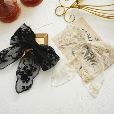 China Japanese and Korean cool hairpin lace clip wholesale smart casual summer and autumn holiday bow small platypus black and white for sale