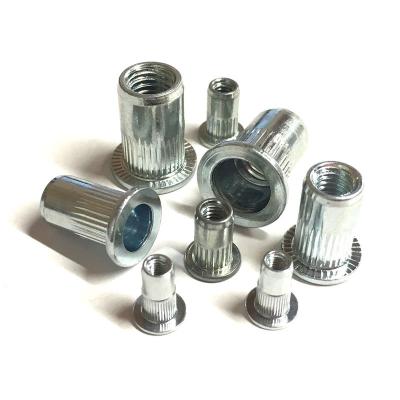 China Flat Head Blind Nut Inserts Bright Zinc Plated M6 Rivet Nut Corrosion Resistant for sale