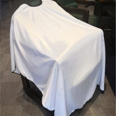 China Salon Treats Waterproof Customized Polyester Barber Cape With Logo For Hair Salon for sale