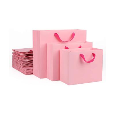 China Large Size Recyclable Paper Jewelry Bag Custom Paper Bag Paper Bag Pink With Handles for sale