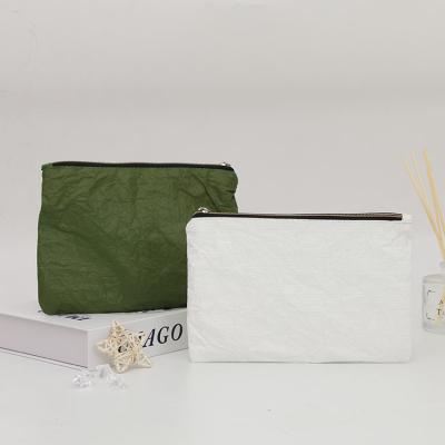 China Eco-friendly custom waterproof makeup bag with zipper reusable washable shopping bag dupont paper bag for sale