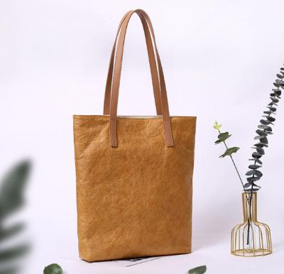 China Reusable Tyvek Dupont Recycling Paper Handbag Shoulder Kraft Paper Shopping Bag With Custom Logos Print for sale