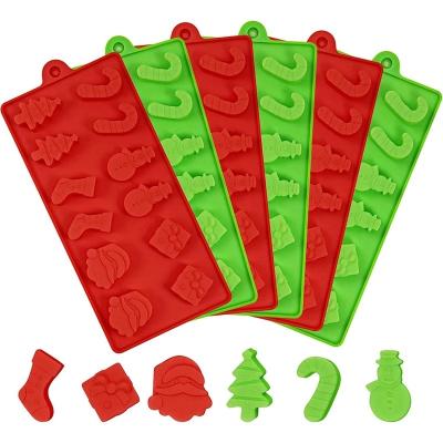 China Christmas Stocked Candy Molds Jelly Molds Trays Silicone Baking Chocolate with Snowman Socks Candy Stick Gift Shapes for sale