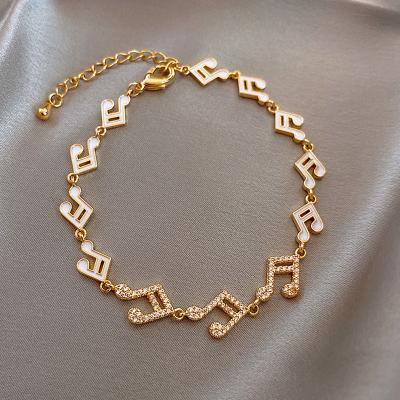 China CLASSIC Korean Jewelry Simple Gold Music Bracelet Earring and Bracelet Set Women Rhinestone Music Bracelet for sale