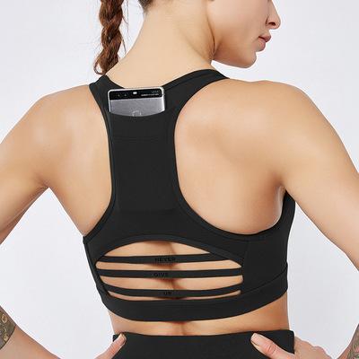 China New Breathable Back Pocket Sports Bra Stripe Mesh Stitching Sports Underwear Yoga Shockproof Horizontal Bra for sale