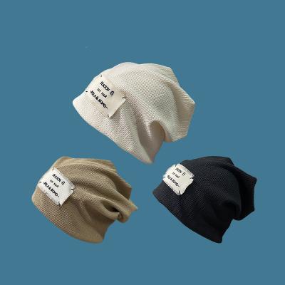 China New Design 2021 Fashion Ins Striped Fashion Unisex Autumn Winter Solid Knitted Hats With Pom Casual 100%Cotton Beanie Cap One Piece for sale