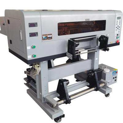 China High Productivity UV Sticker Printer with 3 TX800 Print Heads and 30cm UV Roller for sale