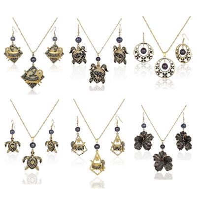 China SophiaXuan Wholesale Hawaiian Holiday Gold Plated Jewelry Sets Black Pearl Turtle Pendant Hawaiian Jewelry Set Yiwu junjian for sale