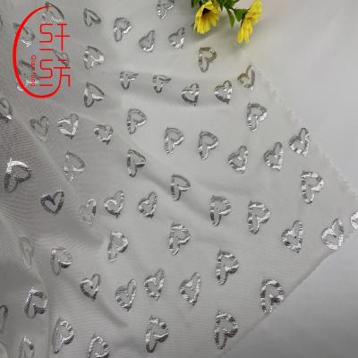 China Whole sale anti-static polyester printing foil fabrics sparkle fabric for wedding wear girl's dress veil for sale