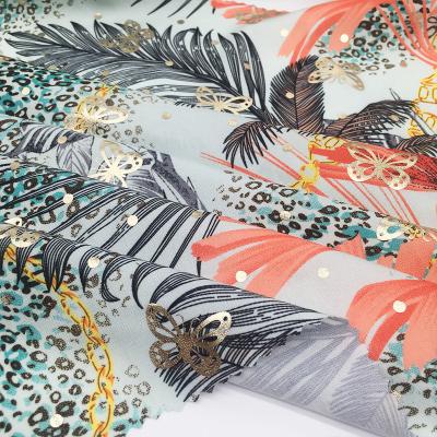 China New design anti-static 100% polyester woven peach foil printed fabric for ladies dress for sale