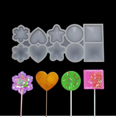 China Viable Wholesale Price 10 Cavity Round Flower Square Shapes Silicone Lollipop Hard Candy Mold With Sticks for sale