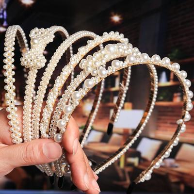 China Custom PRETTY Princess Fashion Bride Headbands Headbands Wholesale Simple Braided Pearl Headband for sale