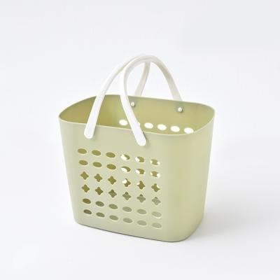 China Viable Wholesale Products Pierced Basket Portable Bathroom Storage Basket Flexible Plastic Hand Held Storage For Toiletries for sale