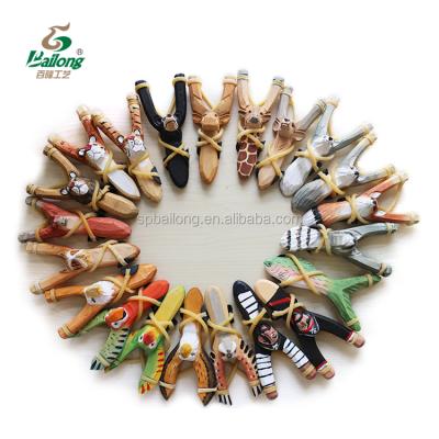 China All World Verified Supplier Ready To Hand Carved Wooden Boat And Souvenir Kids Toy Animal Wooden Slingshot for sale