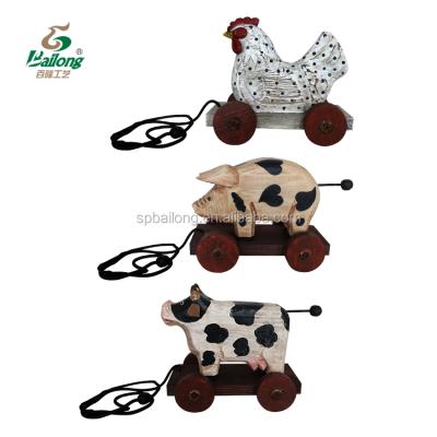 China All Wooden Figurine Animal Toy Wheel World Children's Pull Farm Handmade Carved Rustic Home Decoration for sale