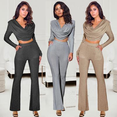 China Amazon Hot Sale QUICK DRY Suit Set Sexy Casual Lady Bronzing Long Sleeve Crop Top Flare Pants Two Piece Set for sale