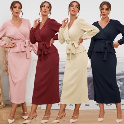 China QUICK DRY Sexy V-Neckline Knitted Women Clothes Set 2022 Autumn And Winter New Long Slim Sleeve Top+Skirt Two Piece Set for sale