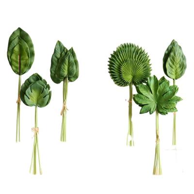 China Artificial Palm Leaves PU Monstera Plant High Quality Artificial Plastic Bouquet Real Touch for sale