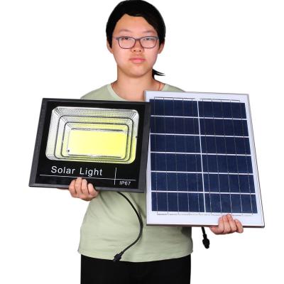 China Garden 100w IP67 Integrated Outdoor ABS Floodlight Solar LED Flood Light for sale