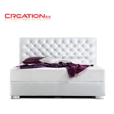 China American Style Design Contemporary Hotel Furniture Button Flower Form Hotel Genuine Leather Covered King Size Headboard For Te koop