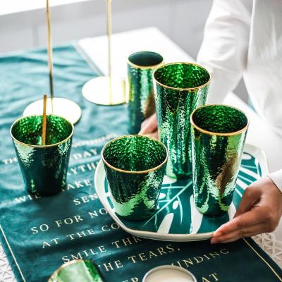 China New Celebrity classic/postmodern lightweight luxury glass restaurant web cupsdesign emeralds decorative glass cups for sale