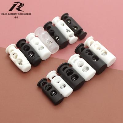 China Nickel Free Double Head Rope Lock Plastic Stopper Plastic Cord Locks for sale