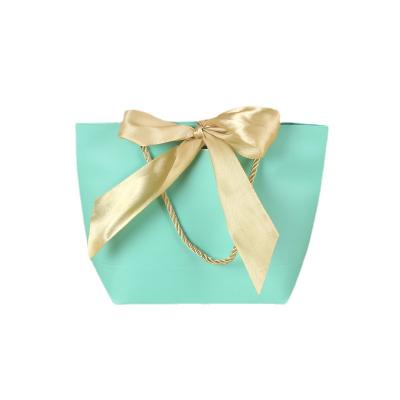 China China Recyclable Competitive Price Brand Logo Luxury Shopping Blue Paper Stylish Custom Gift Bag With Ribbon Handle for sale