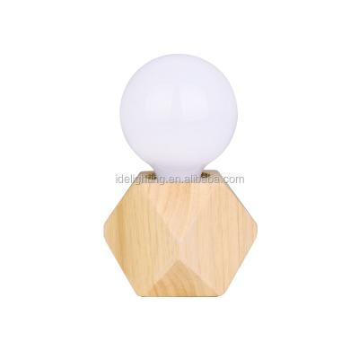 China Modern Useful Handmade High Quality Bedside Polyhedron Geometry Geometry Night Light Wooden Desk Lamp for sale