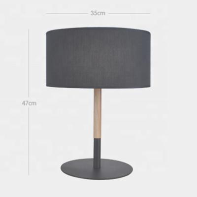 China Modern Nordic style decorative bedside fabric shade round base wooden table lamp for sale