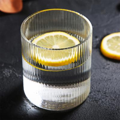 China Nordic Wall Lead Free Clear Ribbed Cup Ripple Cup Glassware Band Style Glass Water Glasses for sale