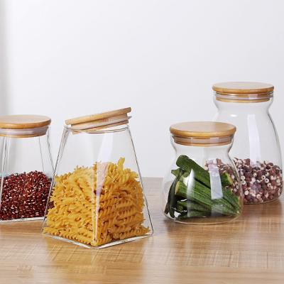 China Wholesale Microwavable Triangle Shape Glass Spice Jars For Storage Food Handmade Borosilicate Jar for sale