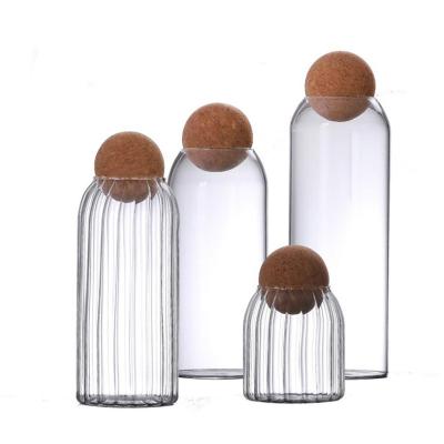 China Microwavable Glass Jars for Storage Food Storage Jars with Wooden Lid Cork Ball Stopper Handmade Borosilicate Glass Lid Jar for sale