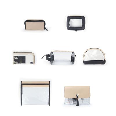 China New Design TPU Travel Waterproof Clear PU Leather Transparent Toiletry Cosmetic Bag With Metal Button for sale