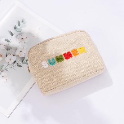 China Custom Natural Plain Embroidery Rivta Makeup Cosmetic Bags Reused And Eco-friendly Logo Jute Canvas Eco Friendly With Personal Zipper Logo for sale